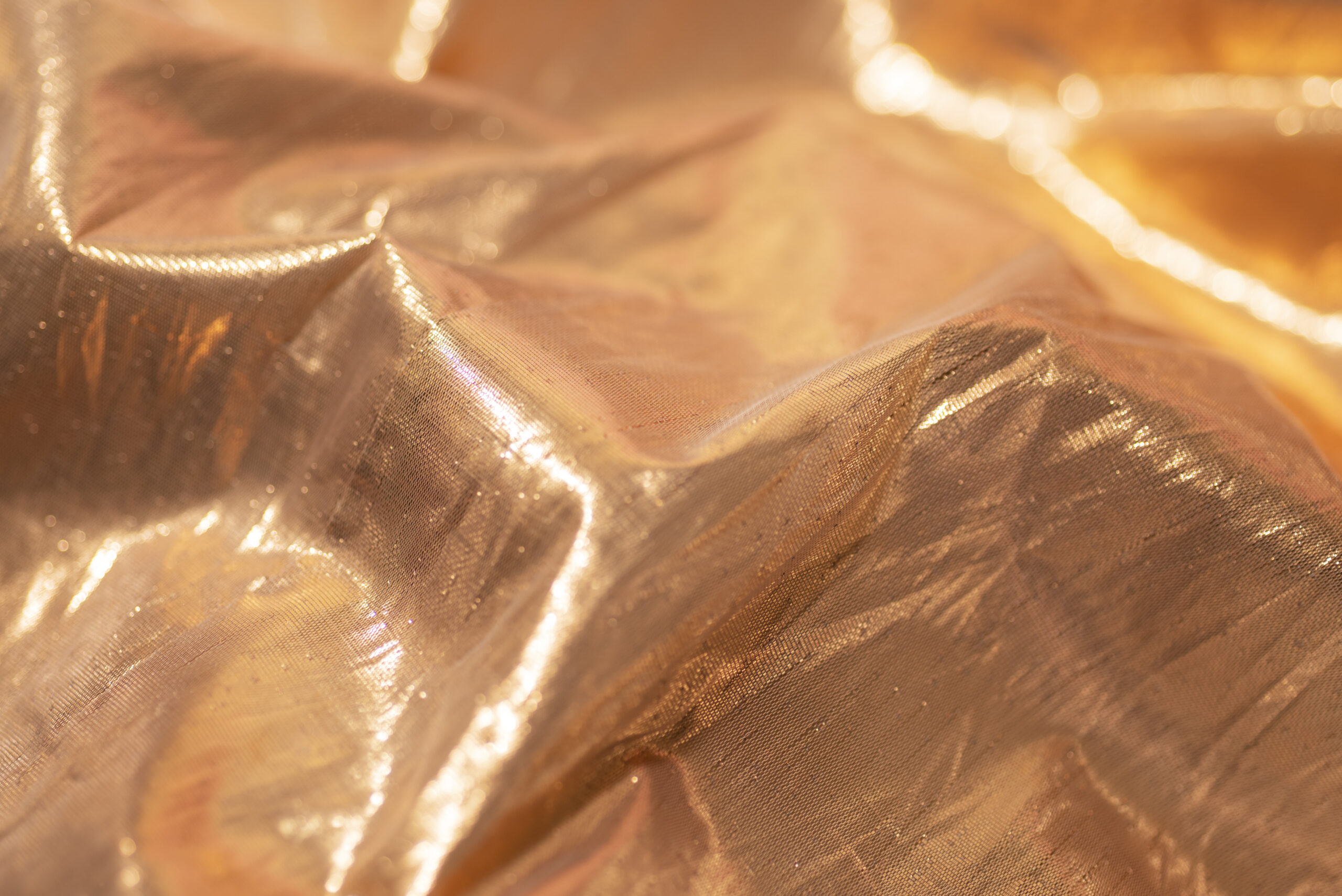 close-up-golden-sparks-glitter
